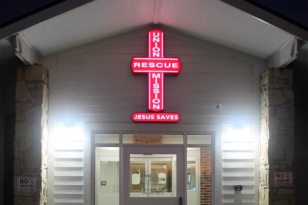 union rescue mission wichita building at night