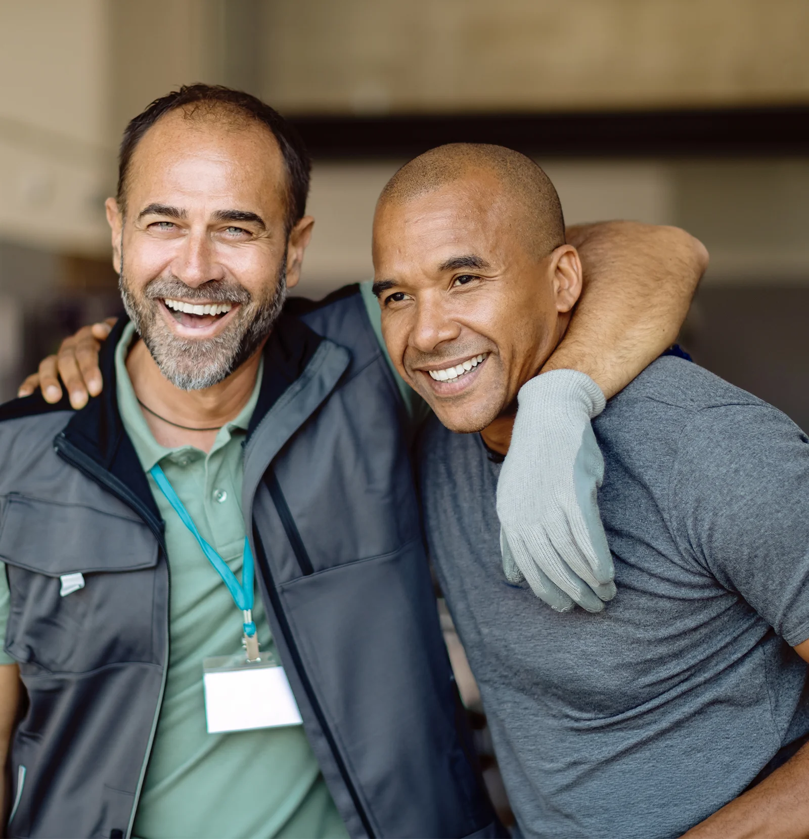 smiling mentor working with man in need